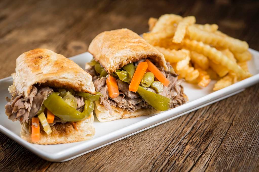 Italian Beef · Sliced thin and piled high on Italian bread. Sweet peppers or hot giardiniera on sandwich complimentary. 610 cal.