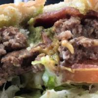 Pops Burger Combo · Served with medium fries and a medium drink, two fresh patties, avocado, bacon, two American...