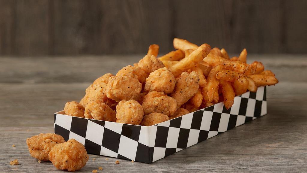 Chicken Bites & Fries Box · Try the crispiest, juiciest, most perfectly seasoned, all-white meat chicken bites in the game served in a box with our Famous Seasoned Fries.