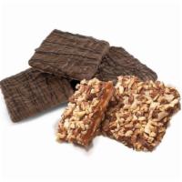 Toffees · Crisp, buttery toffee enrobed in different options!
-English Toffee (Almonds)- Milk/Dark
-Ma...