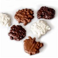Bears™ · Chewy caramel with roasted almonds, roasted cashews, macadamia nuts, peanuts or pecans cover...
