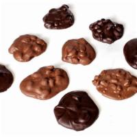 Clusters · Roasted almonds, roasted cashews, coconut, macadamia nuts, pecans and other ingredients cove...