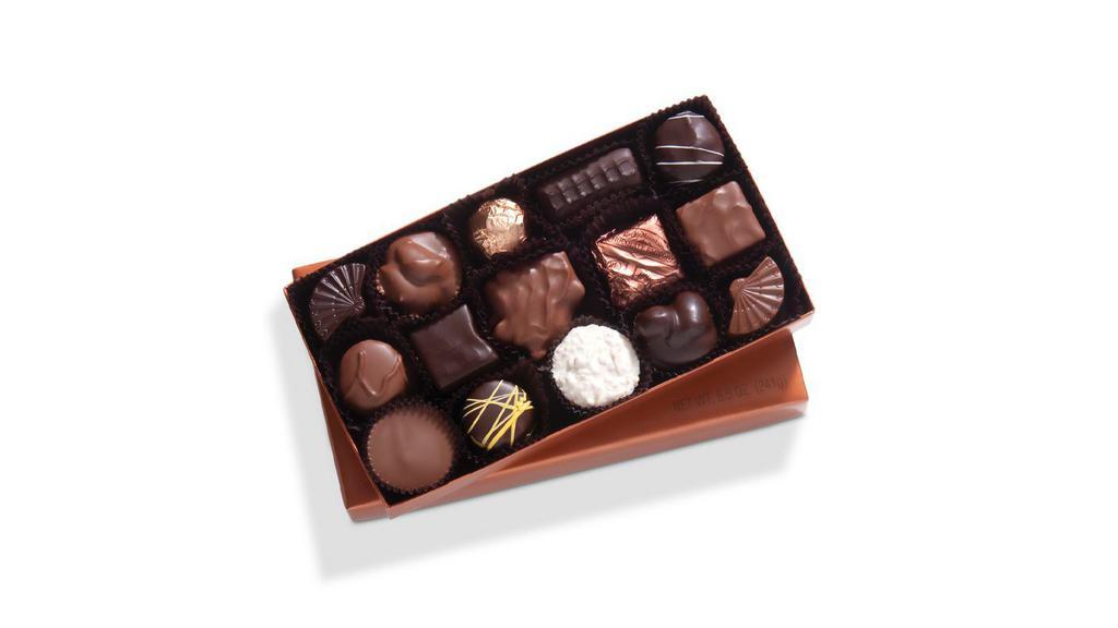Small Chocolate Gift Box Assortment 8.5 Oz. · A sampling of butter creams, chewy caramels and peanut butter pails™, in rich milk and semi-sweet dark chocolate and white confection.