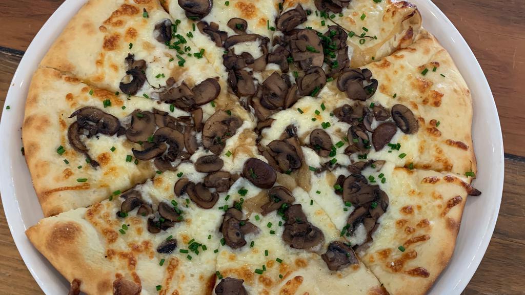 Funghi Di  Pizza (Mushroom) · Garlic Alfredo Sauce, Mozzarella, Wild Mushrooms,Arugula Truffle Oil.