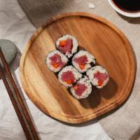Tuna Roll · Tuna with sushi rice wrapped in nori.