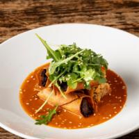 Mary'S Duck Taquitos · Slow-cooked duck, tomato-árbol chile sauce, wild baby arugula.