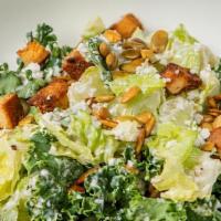Caesar Salad · Organic. Organic romaine, kale toasted pepitas, cotija cheese, caesar dressing, herb croutons.