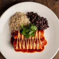 Vegan Enchilada · Impossible meat, sautéed spinach, serranos, mojo de ajo, colorado sauce, chipotle vegan aioli.