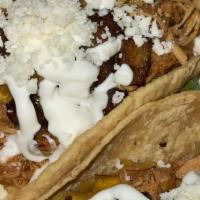 Crispy Chicken Tacos Dorados (2) · Salsa morita, shaved romaine, pico de gallo, queso fresco.