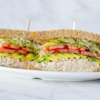 Tuna Avocado Sandwich · our most popular sandwich!  delicious homemade tuna, avocado, tomatoes, lettuce and sprouts ...