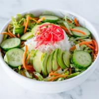 Spicey Ricey · warm long grain rice, avocado, cucumbers, carrots, pickled ginger served on romaine and iceb...
