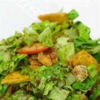 Fattoush Chicken Salad · Romaine lettuce, tossed with lemon and olive oil, tomato, cucumber, chicken, and special sum...