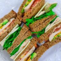 Chicken Club · Triple decker on your favorite toasted bread with chicken breast, avocado, mayo, lettuce, to...