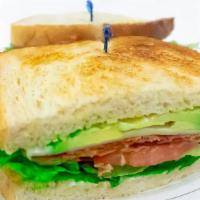 Blta · Bacon, lettuce, tomato, mayo, swiss cheese, and avocado on sourdough toast.