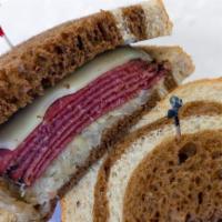 Reuben · Pastrami, sauerkraut, and melted swiss cheese with your choice of Dijon mustard or 1000 Isla...
