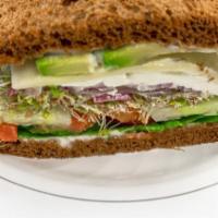 Vegetarian Sandwich · Mayo, Dijon mustard, lettuce, tomato, sprouts, cucumber, provolone, cream cheese, onion, and...