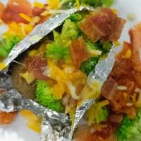 Baked Potato With Butter · add broccoli, cheese or sour cream .50 cents each or 
add bacon, chili or avocado $1.50 each...