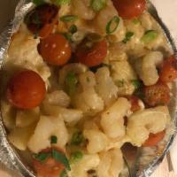 The Lobster Mac · Fresh lobster sautéed in garlic butter with grape tomatoes, all on a garlic Goddess mac. Exc...