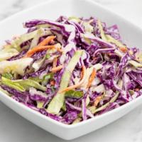 Side Coleslaw · Mixed cabbage, carrot, green onion, and our housemate apple cider slaw.