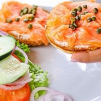 Bagel & Lox · Atlantic smoked salmon served open face with cream cheese, tomatoes, capers and red onions.