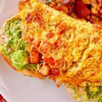 Mexican Breakfast Bagel · Two eggs, cheese and salsa omelette on a bagel with guacamole, avocado and Country potatoes.