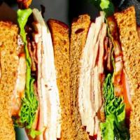 Clubhouse · Turkey, ham, bacon, Swiss cheese, lettuce, tomato and light mayo on toasted sourdough.