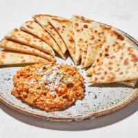 Spicy Feta · A blend of crumbled feta cheese, tomatoes, and spices. Enjoy with sliced veggies or pita bre...