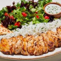 Flat Cut Chicken Kabob Plate · Thinly cut pieces of savory chicken.  Plates include: Basmati rice, pita bread, tzatziki, an...