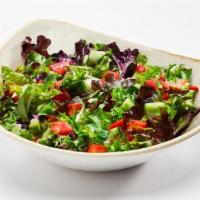Side House Salad · Lettuce medley, tomato and cucumber. Served with house vinaigrette on side.  110 cals..