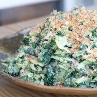 Kale And Brussels · Vegetarian.  Kale greens and brussel sprouts with pickled shallots, parmesan, breadcrumbs, a...