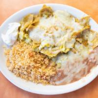 Chile Verde & Eggs · Tender pork meat in green tomatillo sauce with two eggs any style.