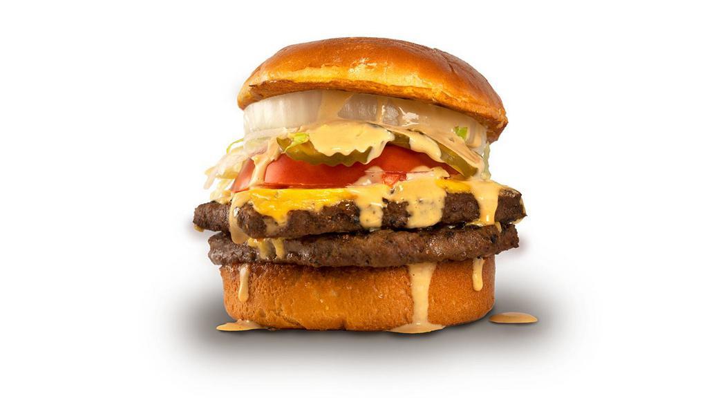 Double With Cheese Burger · Two ¼ pound burger with two slices of cheddar cheese on a buttery toasted brioche bun.