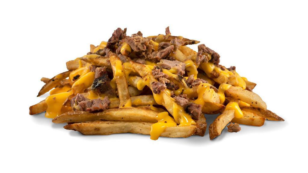 Brisket Cheese Fries · Large order Hand Cut fries smothered with jalapeño cheese sauce and topped with smoked chopped brisket.