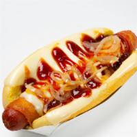 Kansas Dog · Bacon wrapped hot dog, BBQ, griledl onions & cheese.