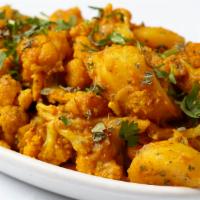 Aloo Gobi Masala · Fresh cauliflower and potato cooked with fresh onion tomato and spices.