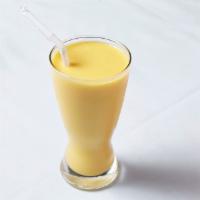 Mango Lassi · Yogurt drink with mango.