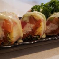 Umi Spring Roll (No Rice) · Inside: crab meat, spicy tuna, mango, avocado, asparagus, spring mix, salmon, tuna. Outside:...