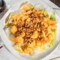 Honey Walnut Shrimp · Crisp shrimp over lettuce glazed with honey walnut sauce topped with walnut served with stea...
