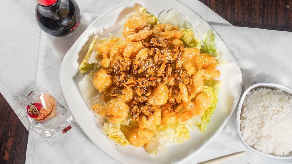 Honey Walnut Shrimp · Crisp shrimp over lettuce glazed with honey walnut sauce topped with walnut served with steam rice.