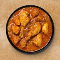 Classic Chicken Curry · (16 Oz.) Pieces of tender chicken are prepared in tomato sauce and cream with Indian spices.