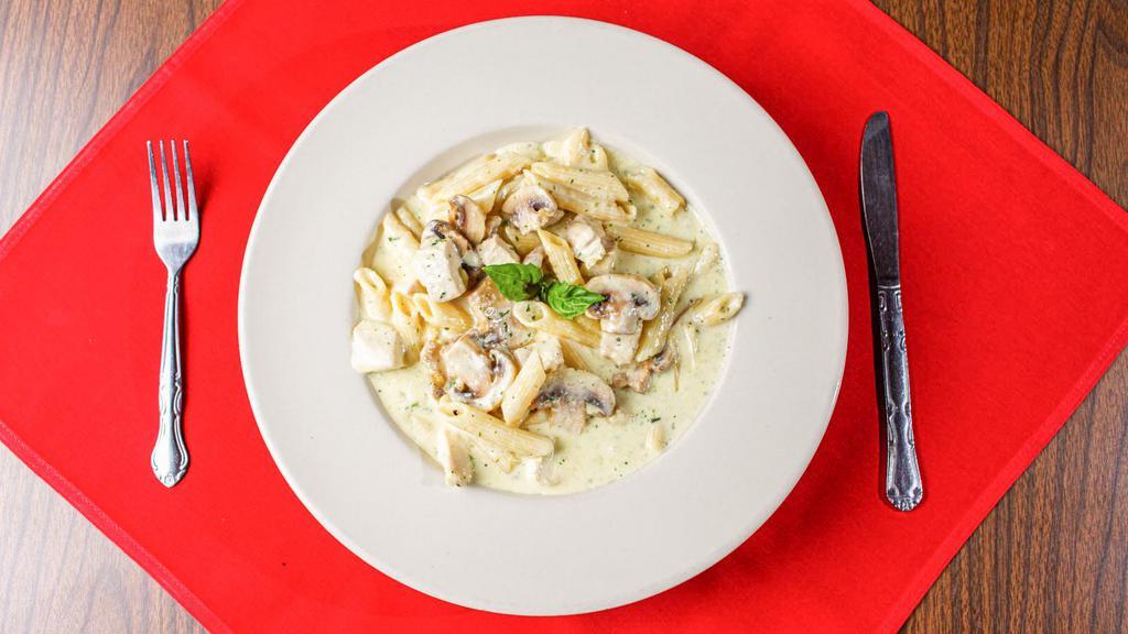 Scarface · Sautéed chicken and mushrooms in alfredo sauce over penne pasta.