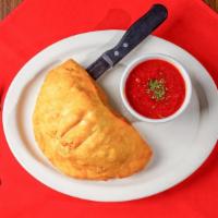 Original Calzone · Pizza dough filled with ground meatballs, diced pepperoni, cheese, onions, mushrooms and bel...