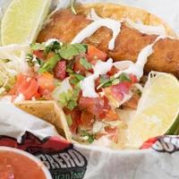 Fish Taco · Crispy fish, white sauce, cabbage, pico de gallo and lime