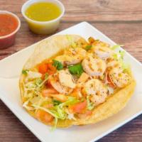 Shrimp Taco · Grilled shrimp, cabbage, pico de gallo, creamy chipotle sauce and lime