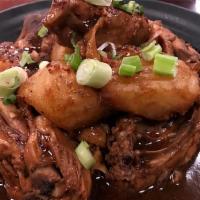 Chicken Adobo · Favorite Filipino dish marinated in vinegar and soy sauce, and slowly cooked in garlic and s...