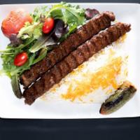 Ground Beef (2 Skewers) · Served with hummus, white basmati rice,
grilled tomato, jalapeno, salad, pita bread