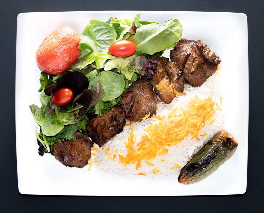 Filet Kabob (Shish) · Tender slices of filet mignon Served with hummus, white basmati rice,
grilled tomato, jalapeno, salad, pita bread