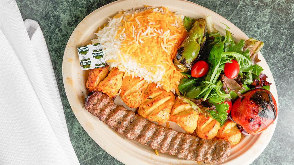 Chicken & Beef Combo · Choice of white or dark meat and 1 skewer of ground beef kabob. Served with hummus, white basmati rice, grilled tomato, jalapeno, salad, pita bread