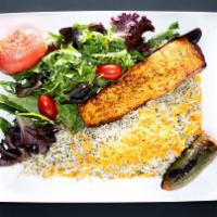 Grilled Salmon · Served with hummus, green rice, grilled
tomato, jalapeno, salad, pita bread