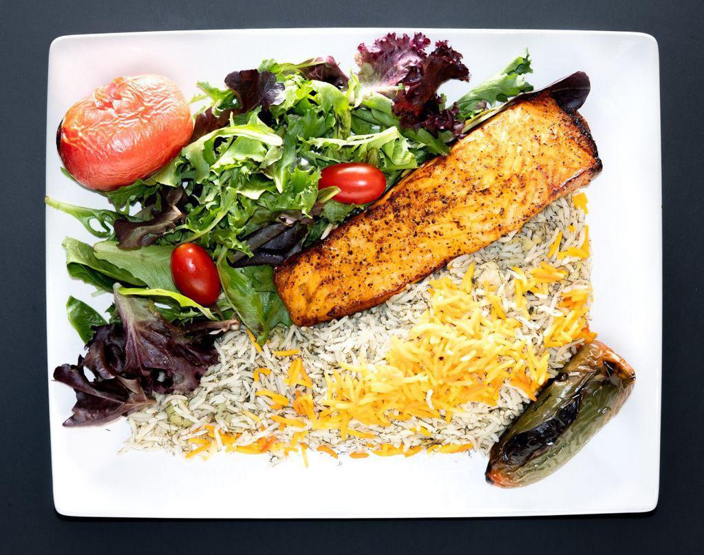 Grilled Salmon · Served with hummus, green rice, grilled
tomato, jalapeno, salad, pita bread